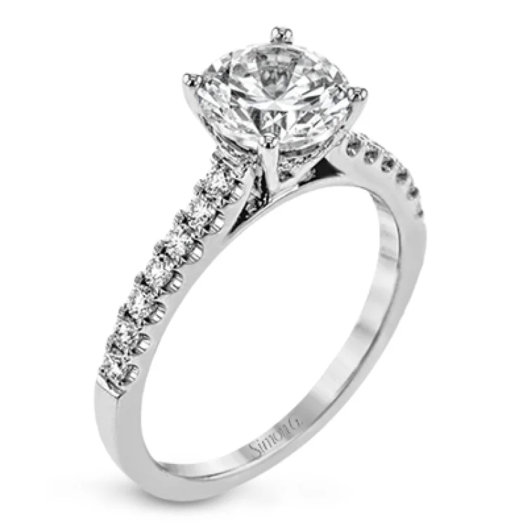 This wedding set is sure to please with a straight design and .60 ctw of white side diamonds.