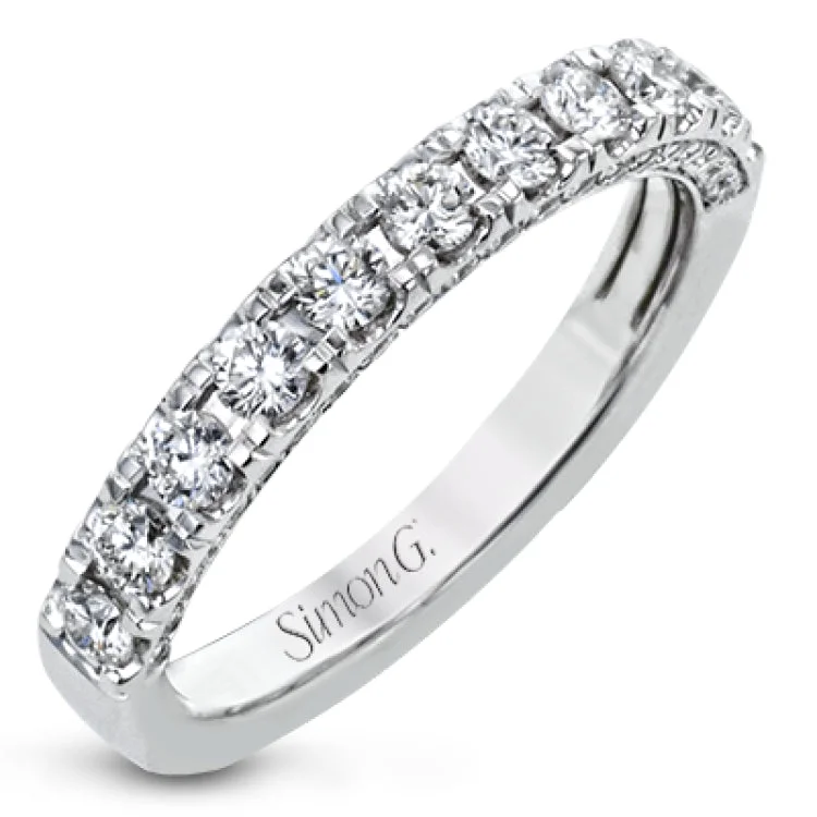 This wonderful band is a classic choice for a wedding band or stacking ring, set with .75 ctw of white diamonds.