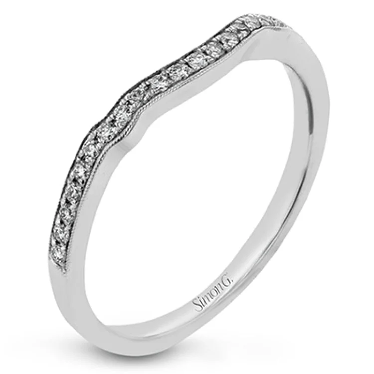 Timelessly beautiful, this white gold engagement ring's stunning design features .44 ctw of round white diamonds flanking the center stone with a lovely tapered effect.