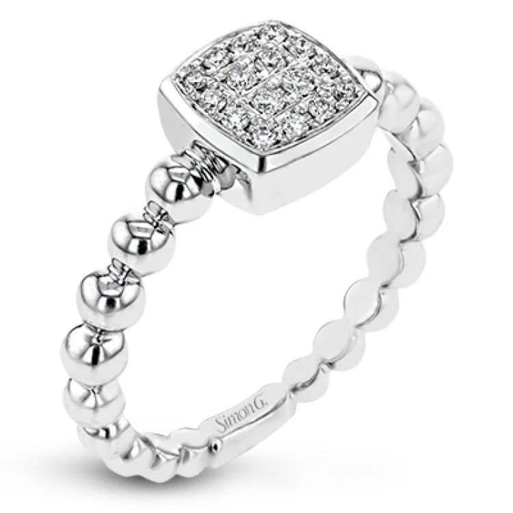 This eye-catching, modern engagement ring features a beadlike effect in white gold, crowned with .15 ctw of round white diamonds clustered in a square center setting.