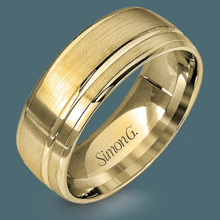 This statement men's wedding band features an accent of 14k rose gold within a 14k white gold background.