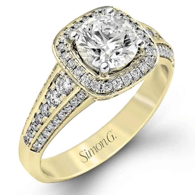 The classic design of this white gold engagement ring is emphasized by .44 ctw of dazzling round cut white diamonds.