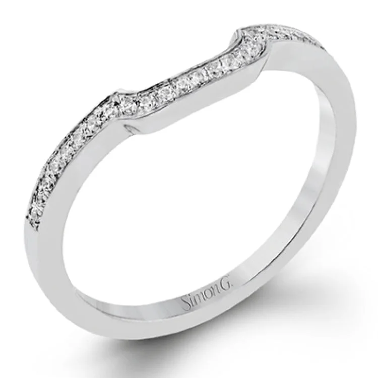 The classic design of this white gold engagement ring is emphasized by .44 ctw of dazzling round cut white diamonds.