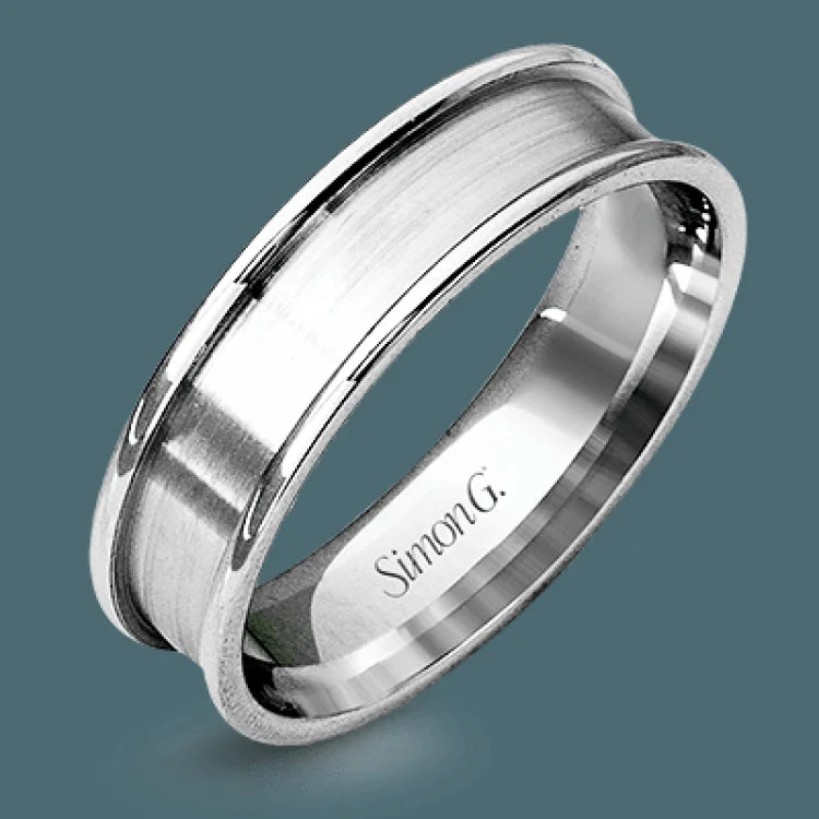 This modern men's wedding band features both rose and white gold in a contemporary design.