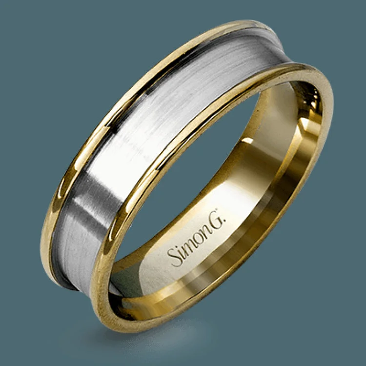 This modern men's wedding band features both rose and white gold in a contemporary design.