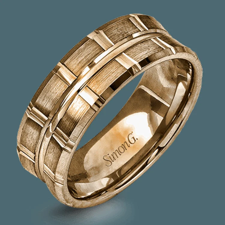 Two wide rows of sleek yellow gold are married with an elegant center cable of striking white gold in this arresting men's wedding band.