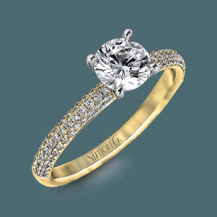 This lovely wedding set features a rounded design which is pave set with .53 ctw of white diamonds.