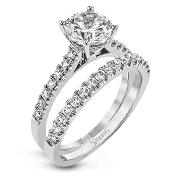 This wedding set is sure to please with a straight design and .60 ctw of white side diamonds.