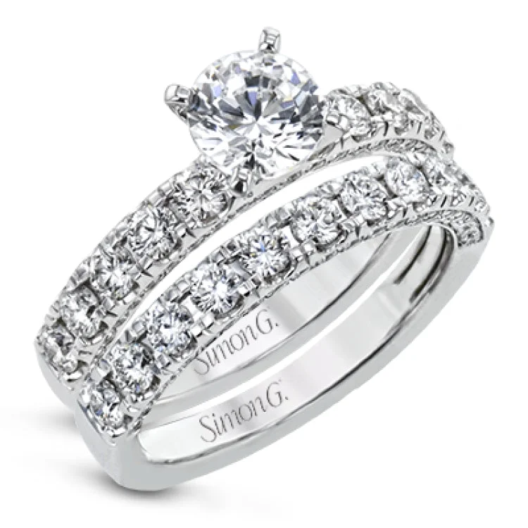 This wonderful band is a classic choice for a wedding band or stacking ring, set with .75 ctw of white diamonds.