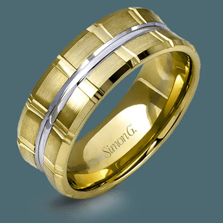 Two wide rows of sleek yellow gold are married with an elegant center cable of striking white gold in this arresting men's wedding band.