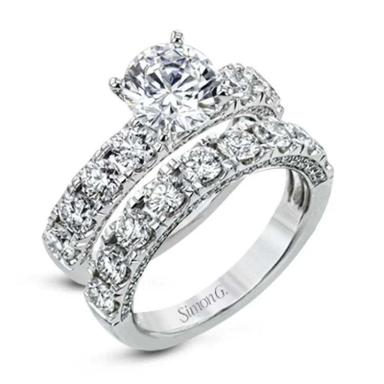 This engagement ring makes a statement with 1.39 ctw of side diamonds that shine from the top ad sides of the ring.