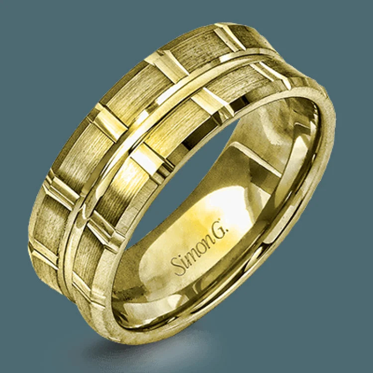 Two wide rows of sleek yellow gold are married with an elegant center cable of striking white gold in this arresting men's wedding band.