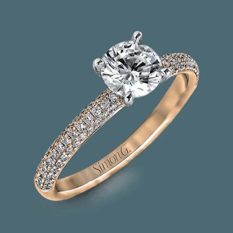 This lovely wedding set features a rounded design which is pave set with .53 ctw of white diamonds.