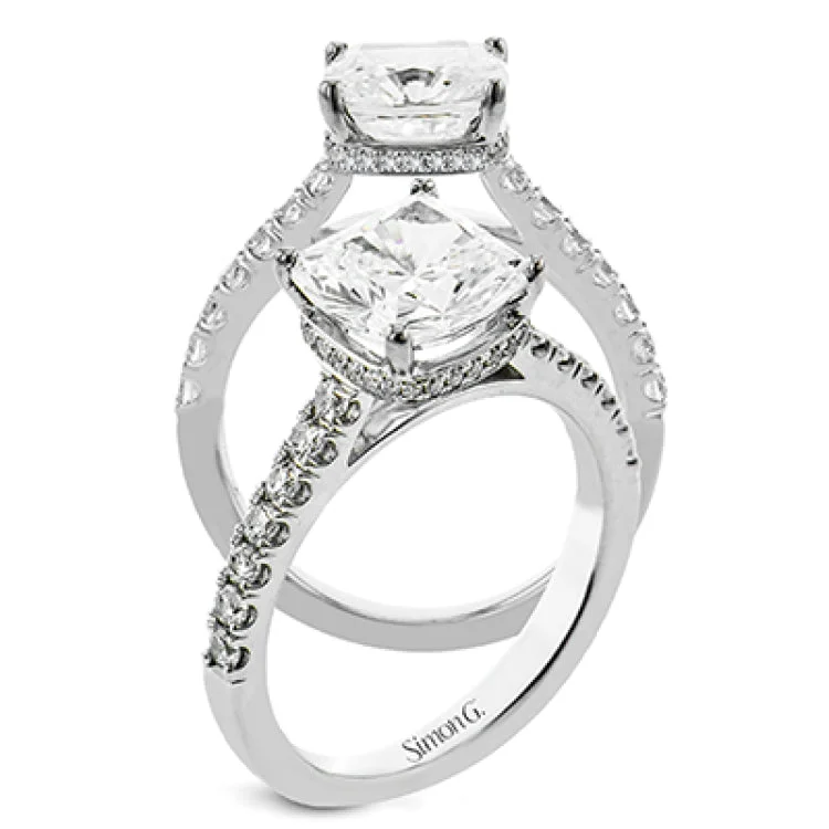 18K White gold underhalo engagement ring featuring .35cttw round white diamonds. (center stone sold separately)