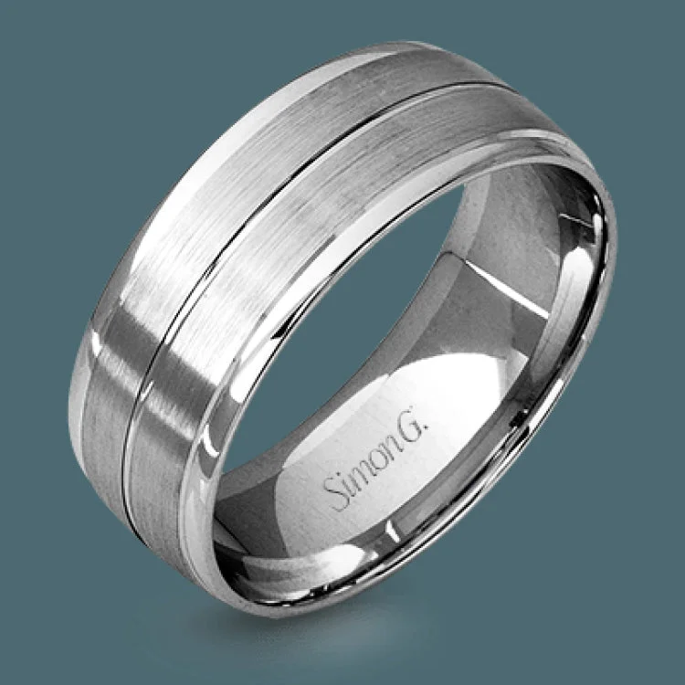 This memorable two-tone men's wedding band features double columns of matte white gold outlined with a sleek outline of yellow gold.