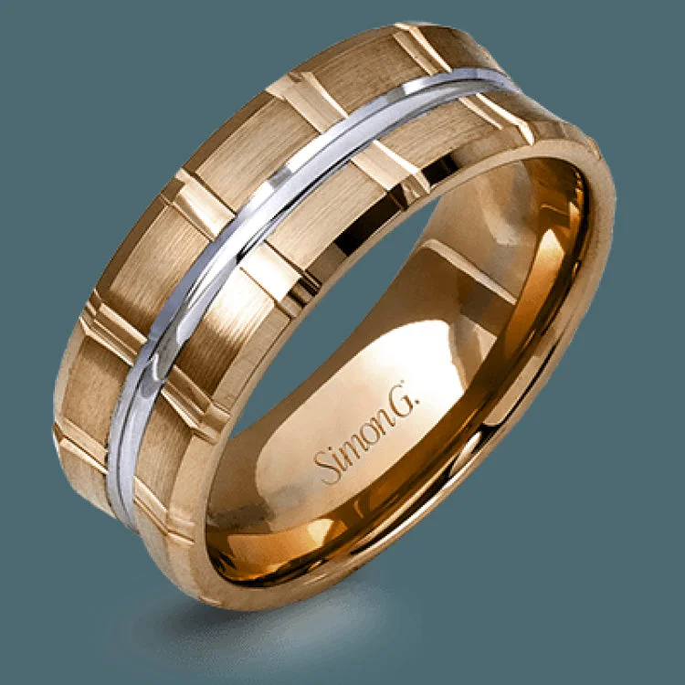 Two wide rows of sleek yellow gold are married with an elegant center cable of striking white gold in this arresting men's wedding band.