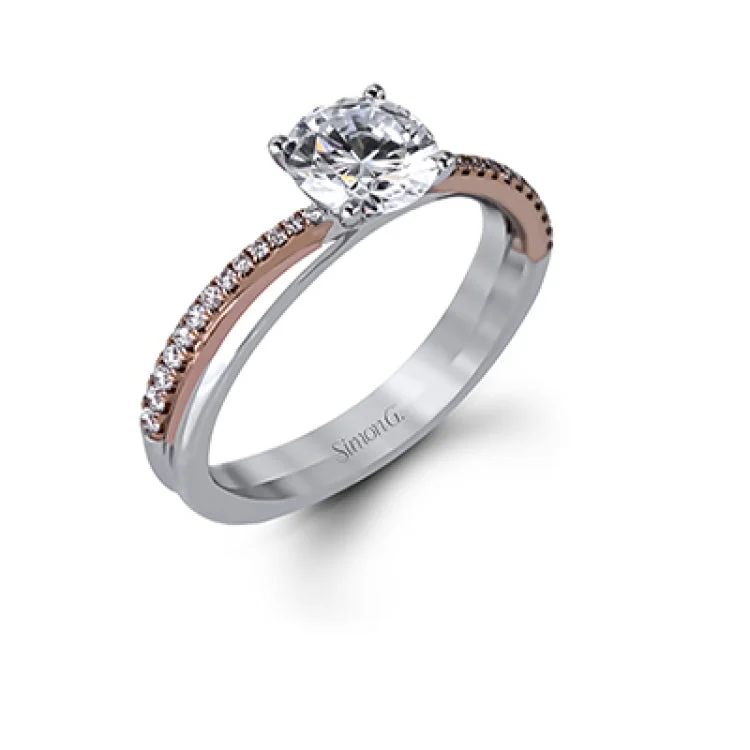 Modern yet delicate, this sophisticated wedding set features .32 ctw of round white diamonds sparkling in white and rose gold.