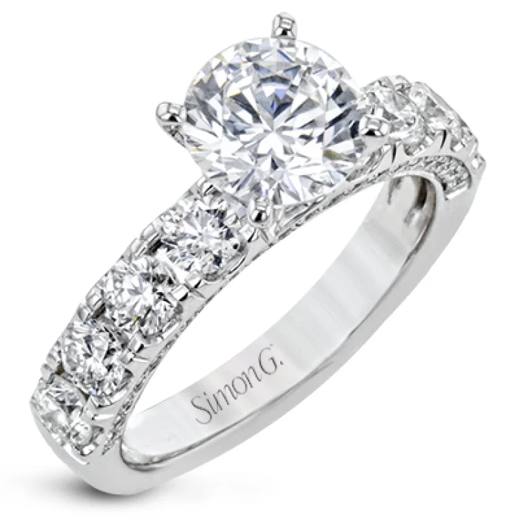 This engagement ring makes a statement with 1.39 ctw of side diamonds that shine from the top ad sides of the ring.