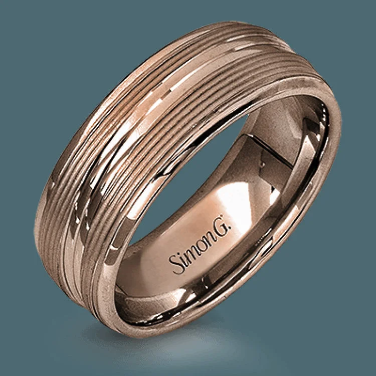 A contemporary ribbed design in lustrous white gold is outlined with two exquisite yellow gold bands in this striking men's wedding band.