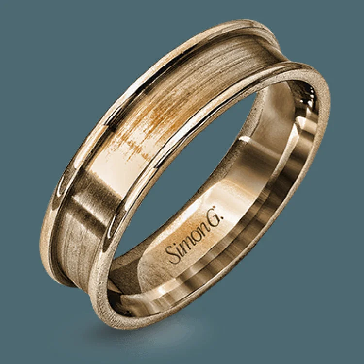 This modern men's wedding band features both rose and white gold in a contemporary design.