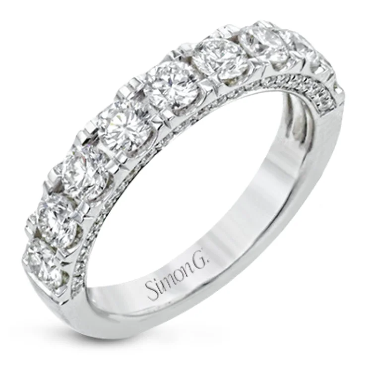 This engagement ring makes a statement with 1.39 ctw of side diamonds that shine from the top ad sides of the ring.